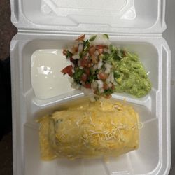 Alfredo’s  Mexican Food - Chicken or beef chimi changa . Red or queso sauce