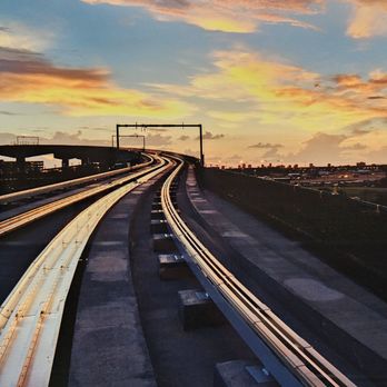 PHX Sky Train - [Professional Picture] of the tracks at sunrise/sunset - Trains Near Me - Phoenix, Arizona