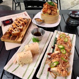 Crispy Salmon, Buttercrab, and Navaro Salmon rolls Crispy Salmon, Buttercrab, and Navaro Salmon rolls