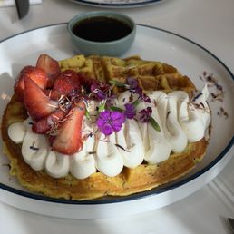 LEMON POPPYSEED WAFFLE vanilla mascarpone cream, strawberries, bergamot maple syrup LEMON POPPYSEED WAFFLE vanilla mascarpone cream, strawberries, bergamot maple syrup