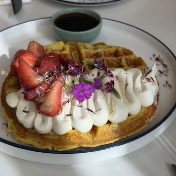 Two Hands - LEMON POPPYSEED WAFFLE vanilla mascarpone cream, strawberries, bergamot maple syrup - Breakfast & Brunch Near Me - Dallas, Texas Two Hands - LEMON POPPYSEED WAFFLE vanilla mascarpone cream, strawberries, bergamot maple syrup - Breakfast & Brunch Near Me - Dallas, Texas