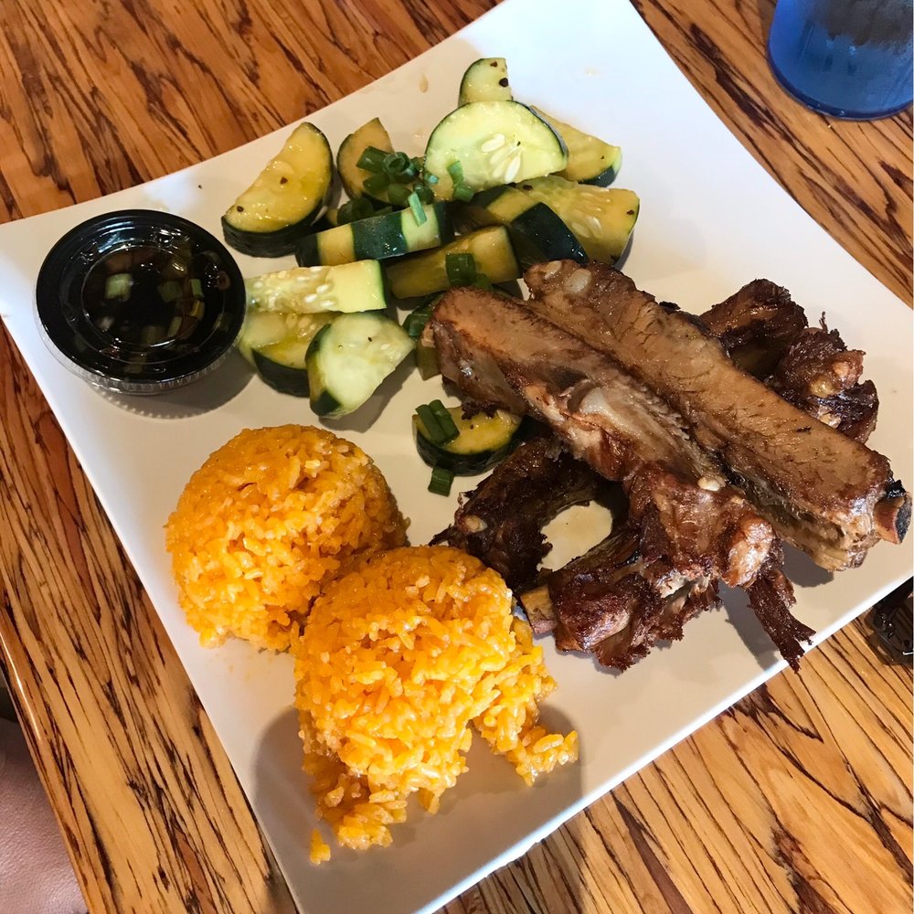 Guahan Grill - Chamorro style fried ribs with fried rice and pickled cucumbers. - Barbeque Near Me - Oceanside, California Guahan Grill - Chamorro style fried ribs with fried rice and pickled cucumbers. - Barbeque Near Me - Oceanside, California