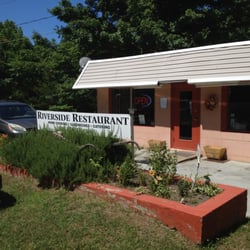 Riverside Restaurant & Catering - Front of the place, with sign offering Home Cooking, Sandwiches, and Catering.