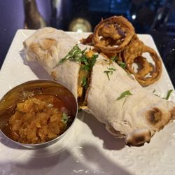 India Bar and Grill - Chicken Tikka Bombay Naan Burrito Lunch Special! A+ With chickpea batter fry onion fritter and pineapple relish. Loved everything about it.