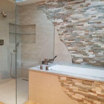 TVR Tiles - a bathroom with a glass shower - Flooring Near Me TVR Tiles - a bathroom with a glass shower - Flooring Near Me