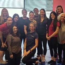 Empower Martial Arts and Self-Defense - Jennifer Eden, owner/operator of Empower Martial Arts and Self-Defense, teaching The Woman Warrior Course at Cushman &Wakefield.