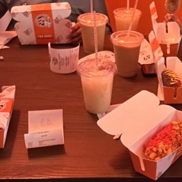a table full of food and drinks