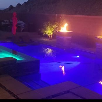 Mission West Pools & Spas - Our nighttime view... led color lights in our spa and main pool with fire/water pots - Pool & Hot Tub Service Near Me - Henderson, Nevada Mission West Pools & Spas - Our nighttime view... led color lights in our spa and main pool with fire/water pots - Pool & Hot Tub Service Near Me - Henderson, Nevada