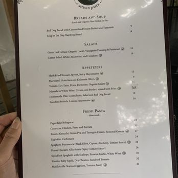 Orto Artisan Pasta - a hand holding a menu - Italian Near Me - North Vancouver, British Columbia