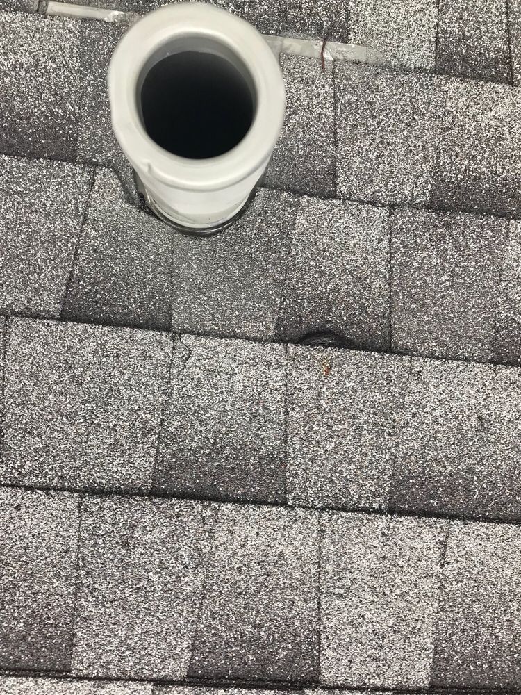 Slide of Mackel Roofing Company