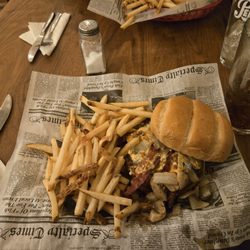 The Porch Light - Bleu Burger with fries.