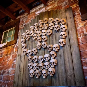 Mayawell Bar - a number of skulls on a wall - Cocktail Bars Near Me - Birmingham, Alabama Mayawell Bar - a number of skulls on a wall - Cocktail Bars Near Me - Birmingham, Alabama