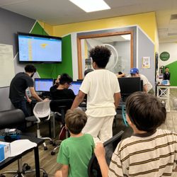 The Coder School Pasadena - Learning how to program the robots they've built using block-coding.