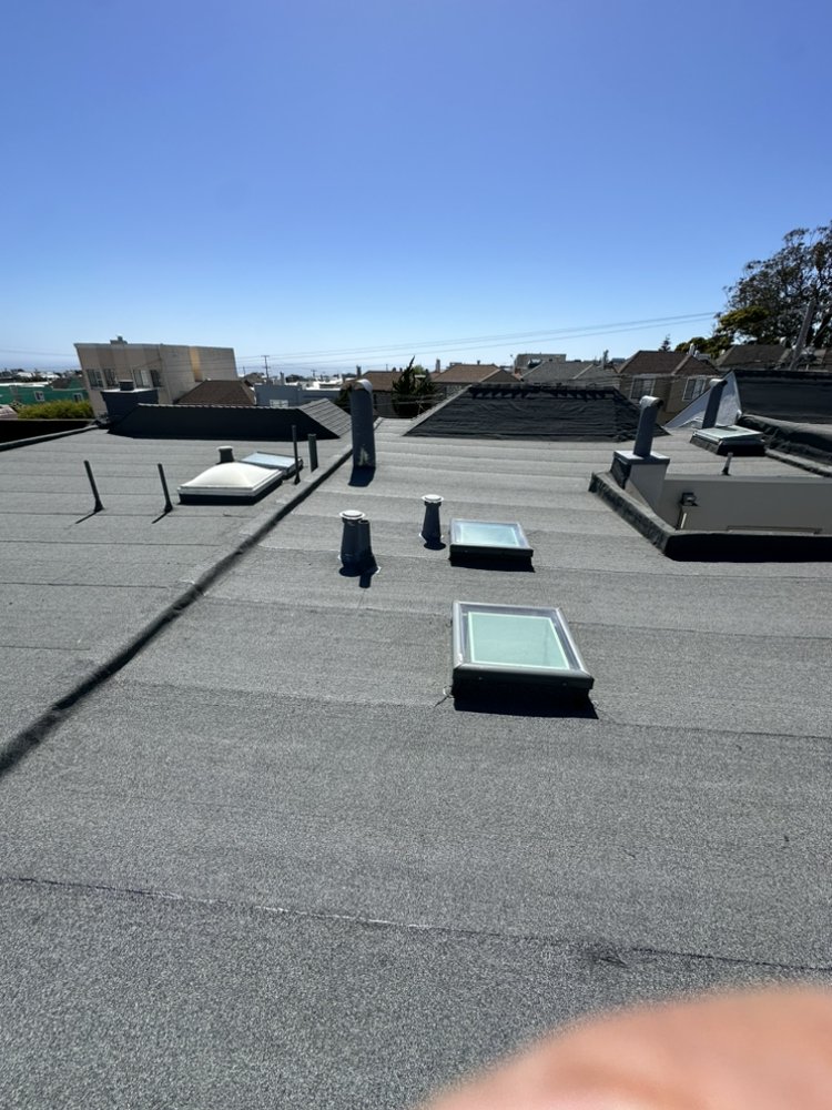 Slide of Rene’s Roofing