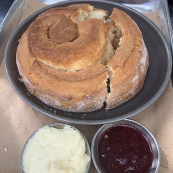 North High Brewing - Giant Cinnamon roll with frosting and fruit preserves on the side - Brewpubs Near Me - Dublin, Ohio North High Brewing - Giant Cinnamon roll with frosting and fruit preserves on the side - Brewpubs Near Me - Dublin, Ohio
