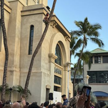 Ka Moana Luau - Climbing up the tree for a coconut - Performing Arts Near Me - Honolulu, Hawaii