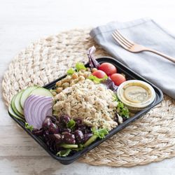 Catered Fit - Mediterranean tun salad with chickpeas, cucumbers, match stick carrots, cherry tomatoes, kalmata olives, & greek dressing over mixed greens.