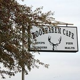 a sign for koosharem cafe
