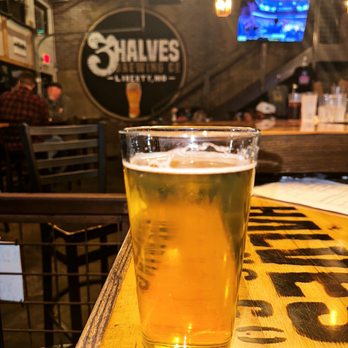 3 Halves Brewing - a pint of beer on a bar - Breweries Near Me - Liberty, Missouri