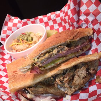 Corner Clubhouse - a roast beef sandwich with a side of coleslaw - Sports Bars Near Me - Magnolia, Arkansas
