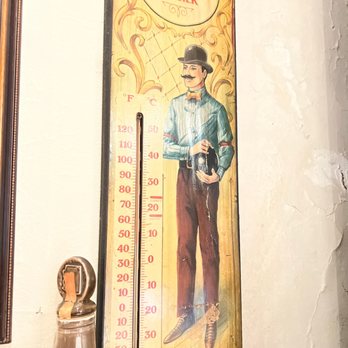 The Pineville Tavern - a thermometer on a wall - Bars Near Me - Pineville, Pennsylvania