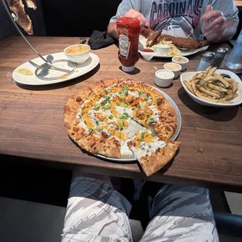 Yard House - Buffalo chicken pizza Jumbo Bavarian Pretzel - Bars Near Me - Tampa, Florida
