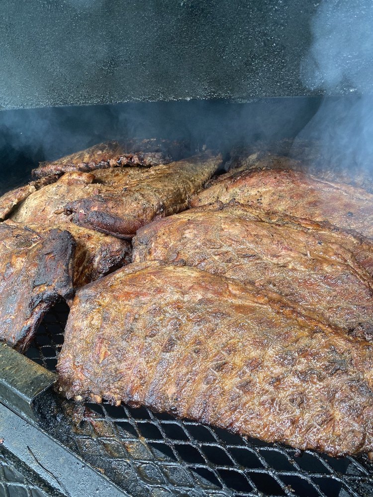 Revel's Meats & Groceries Logo