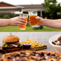 Cheers with an onsite brewed beer from Old 290 Brewery!