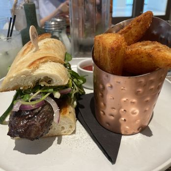 Limón Rooftop Bar - Steak Sandwich with delicious fries - Mediterranean Near Me - Naples, Florida Limón Rooftop Bar - Steak Sandwich with delicious fries - Mediterranean Near Me - Naples, Florida