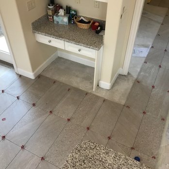 Summit Tile & Stone - Laying the tile with spacers - General Contractors Near Me - Henderson, Nevada