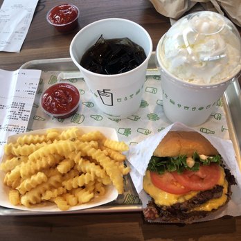 Shake Shack Waverly Place - Double shak cheeseburger, Krinkle fries, fountain drink, strawberry milkshake with malt and whipped cream. - Fast Food Near Me - Cary, North Carolina Shake Shack Waverly Place - Double shak cheeseburger, Krinkle fries, fountain drink, strawberry milkshake with malt and whipped cream. - Fast Food Near Me - Cary, North Carolina