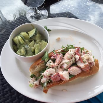 Cobalt - Lobster roll (minus a bite ) :O with cucumber avocado salad -18.00 (surprisingly low for the amount of lobster and oceanfront) - New American Near Me - Vero Beach, Florida