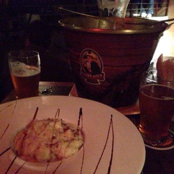 JazzB - Risoto de cachaça e carne seca, acompanhado de jarra de chopp tipo belgian golden ale. - Jazz & Blues Near Me - São Paulo, SP