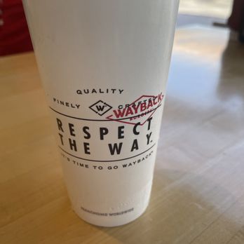 Wayback Burgers - a cup of coffee on a table - American Near Me - Covington, Georgia Wayback Burgers - a cup of coffee on a table - American Near Me - Covington, Georgia