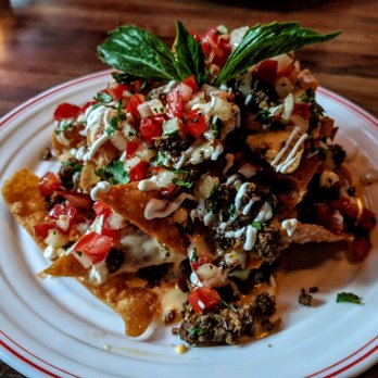 Expatriate - The nachos with wontons, crema, and salsa were a revelation - Cocktail Bars Near Me - Portland, Oregon