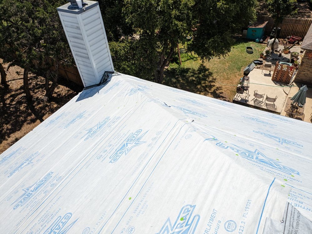 Slide of Big Boy Roofing