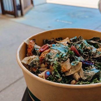Whole Slvce - Kale, Artichoke, Sun dried Tomato, and kalamata olive Salad - Pizza Near Me - Tucson, Arizona Whole Slvce - Kale, Artichoke, Sun dried Tomato, and kalamata olive Salad - Pizza Near Me - Tucson, Arizona