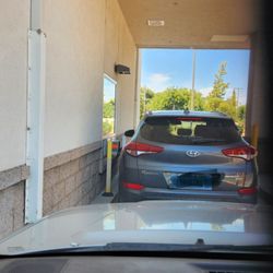 Walgreens - 1 car ahead of me and still a 25 minute wait.