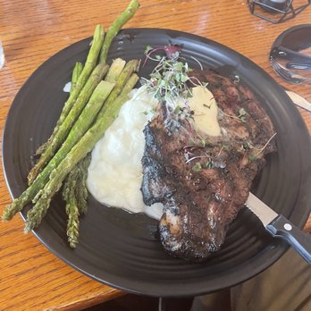 Anglers Riverfront Restaurant - Ribeye w/ mashed potatos and asparagus - Desserts Near Me - Island Park, Idaho