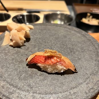 Sora Omakase - a piece of sushi on a plate - Sushi Bars Near Me - Stony Brook, New York Sora Omakase - a piece of sushi on a plate - Sushi Bars Near Me - Stony Brook, New York
