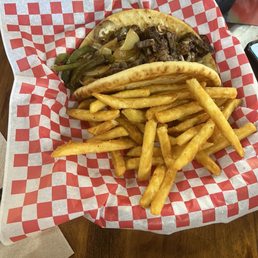 Philly steak on pita with fries Philly steak on pita with fries