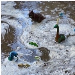 Kid Works Children's Center - The dinos are taking a bath in the river.