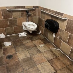 TJ Maxx - This is the handicap stall where there's urine and toilet paper on the floor. Just unsanitary
