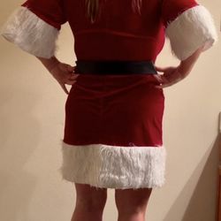 The Bodyshop Gentlemans Club - Mrs. Claus getting ready to unwrap herself for the fellas.