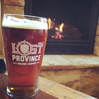 Lost Province Brewing - Pumpkin Ale next to the fireplace - Pizza Near Me - Boone, North Carolina Lost Province Brewing - Pumpkin Ale next to the fireplace - Pizza Near Me - Boone, North Carolina