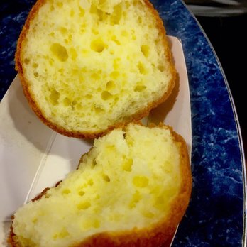 La Nueva Bakery - According to my friend, the sponge like holes prove authenticity of the traditional style of baking this bread* called bunuelo - Bakeries Near Me - Jackson Heights, New York
