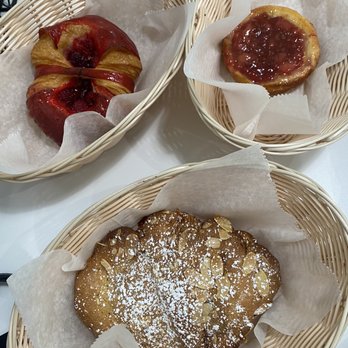 Pascal & Cathy Bakery - Top left - raspberry croissant Top right - raspberry apple brioche pastry Bottom- almond croissant - Bakeries Near Me - Pompano Beach, Florida Pascal & Cathy Bakery - Top left - raspberry croissant Top right - raspberry apple brioche pastry Bottom- almond croissant - Bakeries Near Me - Pompano Beach, Florida