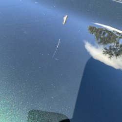 Woodie’s Wash Shack - 66th Street - Huge scratch across the hood.