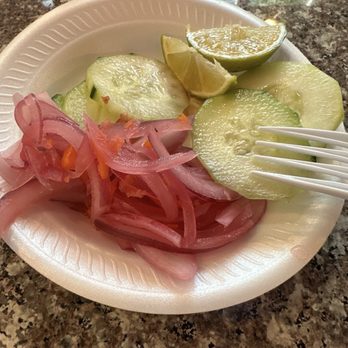 Taqueria Tomateros - Sides of cucumber and pickled onion. - Mexican Near Me - Riverside, California Taqueria Tomateros - Sides of cucumber and pickled onion. - Mexican Near Me - Riverside, California