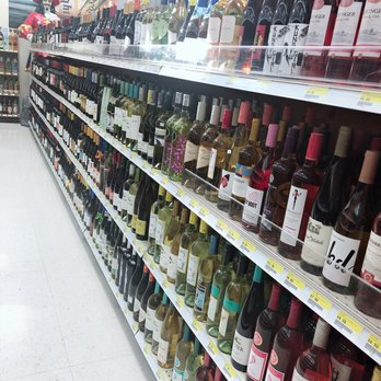 Royal Market - rows of wine bottles on shelves - Tobacco Shops Near Me - Reno, Nevada Royal Market - rows of wine bottles on shelves - Tobacco Shops Near Me - Reno, Nevada
